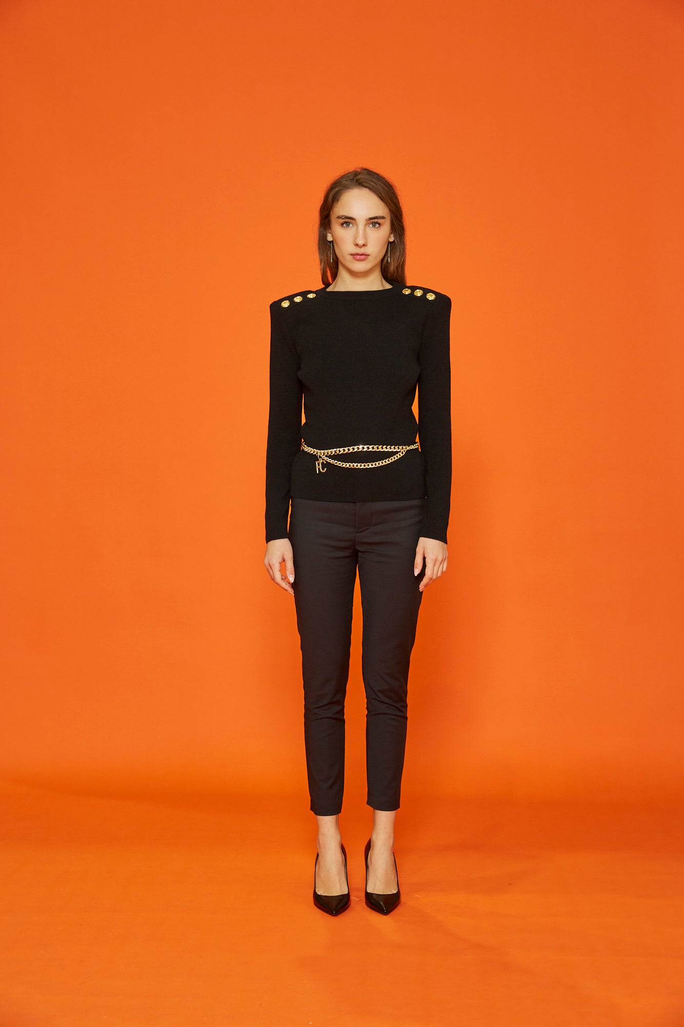 Shirt with shoulder straps and gold buttons black knitwear