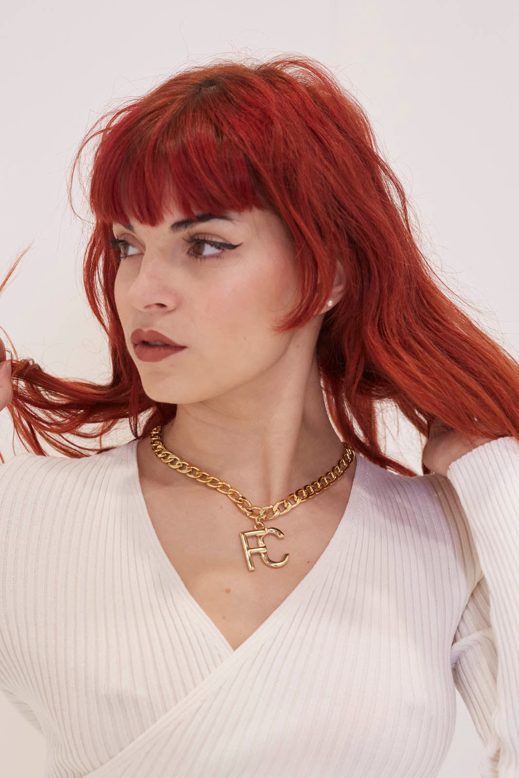 Sara in the gold chain FC necklace